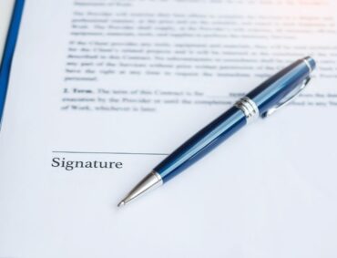signature-with-pen-on-contract-documents-contract-2022-08-01-01-18-32-utc (1)